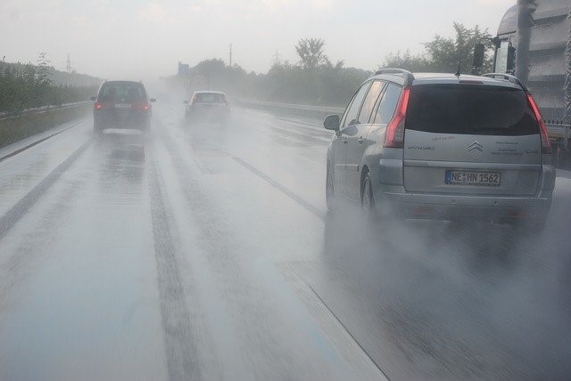 When driving during the daytime in fog rain or smoke you must?